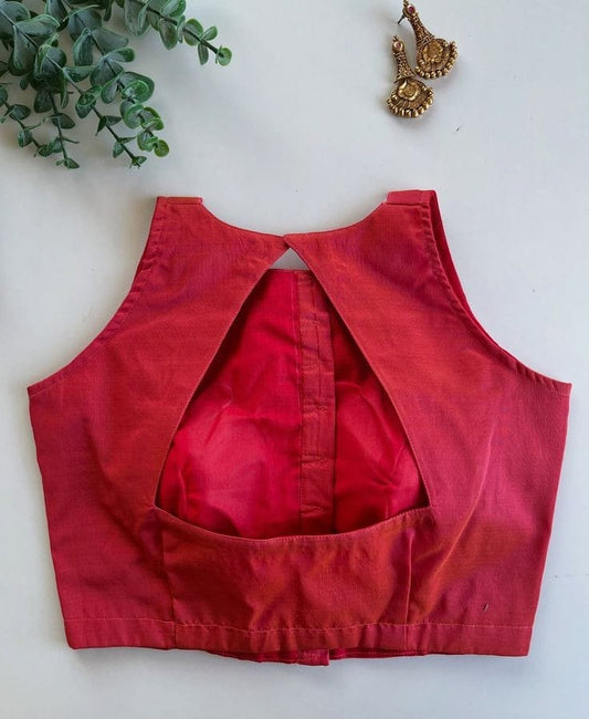 Elegant Red Silk Sleeveless Blouse with Front Button Detailing & Keyhole Back
