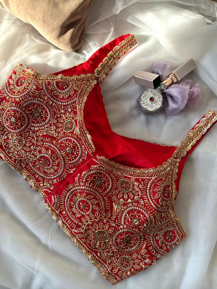 Royal Red Heavy Zari Embroidered Bridal Blouse with Intricate Gold Detailing