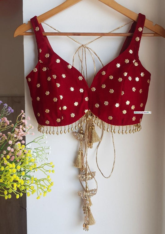 Red Sleeveless Blouse with Gold Butti Work & Tie-Up Back