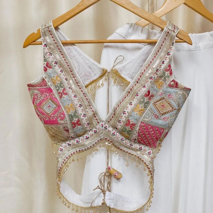 Multicolor Embroidered Designer Blouse with Deep V-Neck & Cutwork Back Tassels